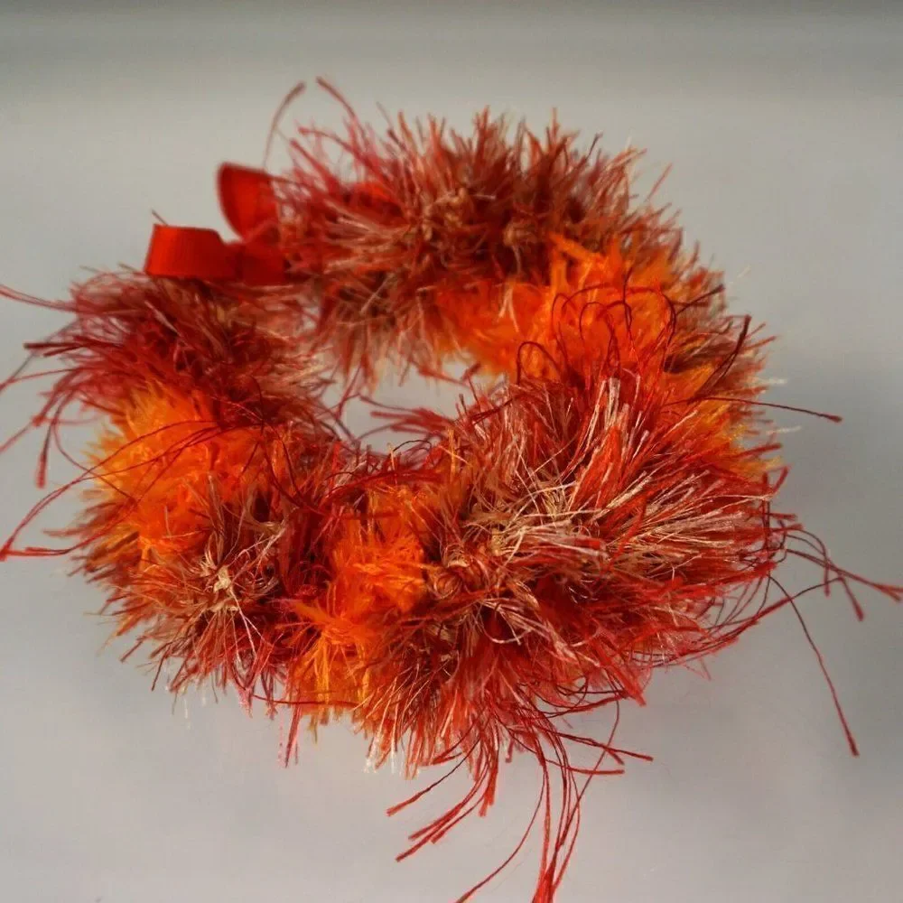 Kupee Wrist Lei Pair Red Orange Eyelash Yarn Tie-Ribbon